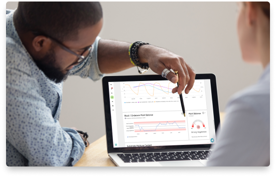 Grower optimizing crop growth with data insights